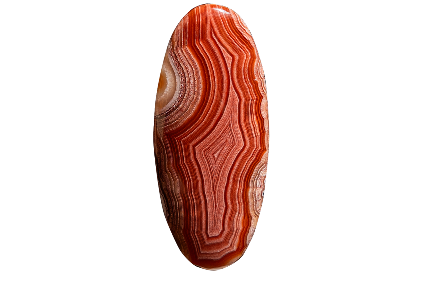 A polished oval agate stone cabochon with wavy banded patterns in shades of red, orange, and cream, isolated on a solid white background.