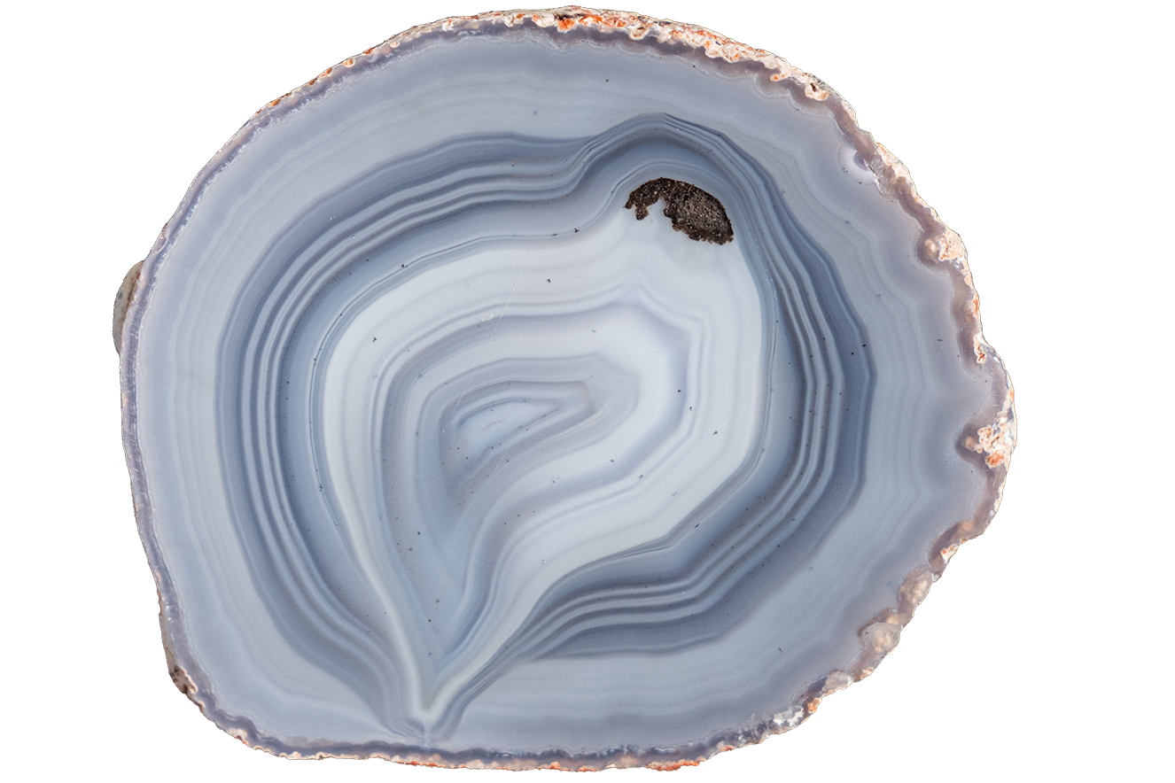 A polished slice of agate or jasper stone with concentric bands of pale blue, lavender, white, and gray, with a rough coppery-brown outer edge, shown on a plain white background.