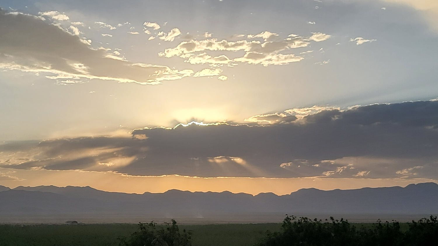Sunset over the sierra madre mountain range with clouds in the sky